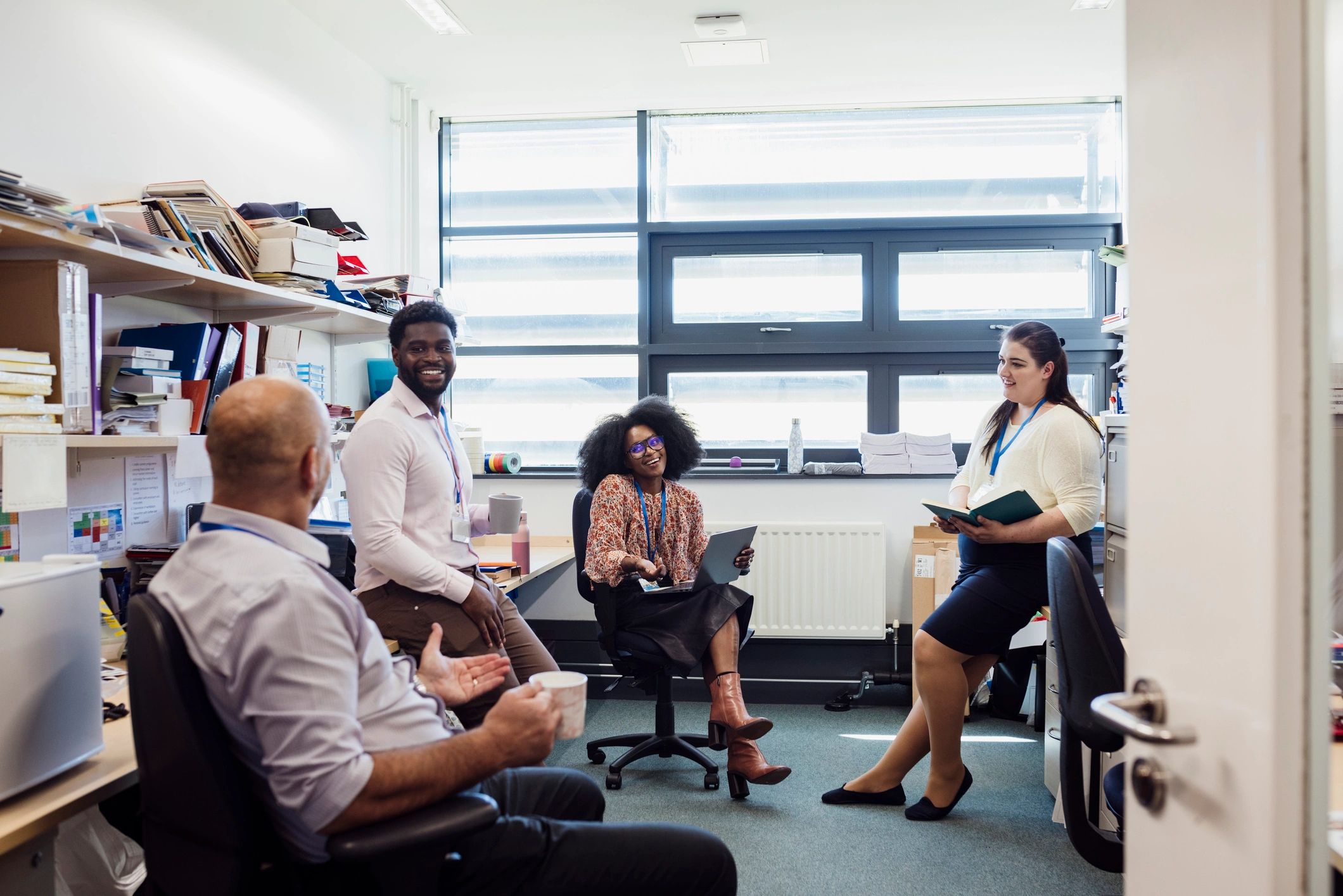 Team members collaborating during a leadership session