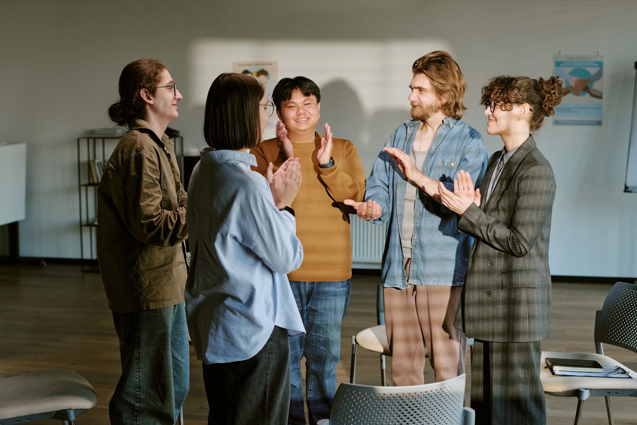 Young adults encouraging one another